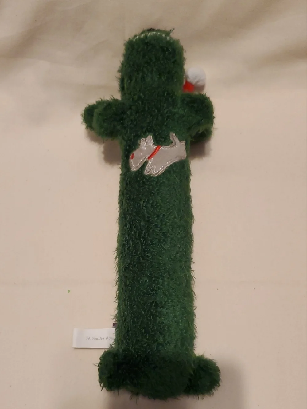 Green Loofa Dog Toy with Santa Hat